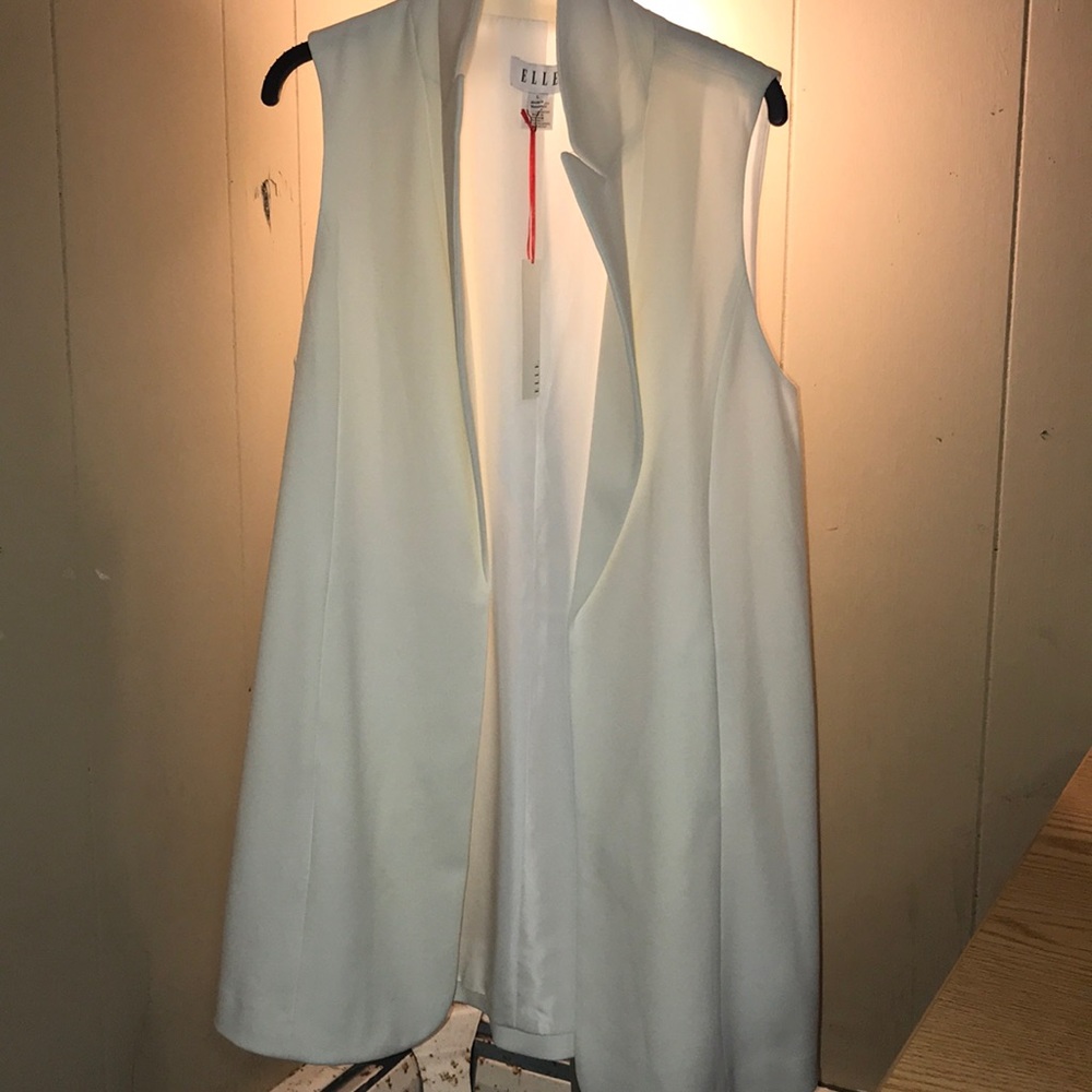Off white long vest new with tags.